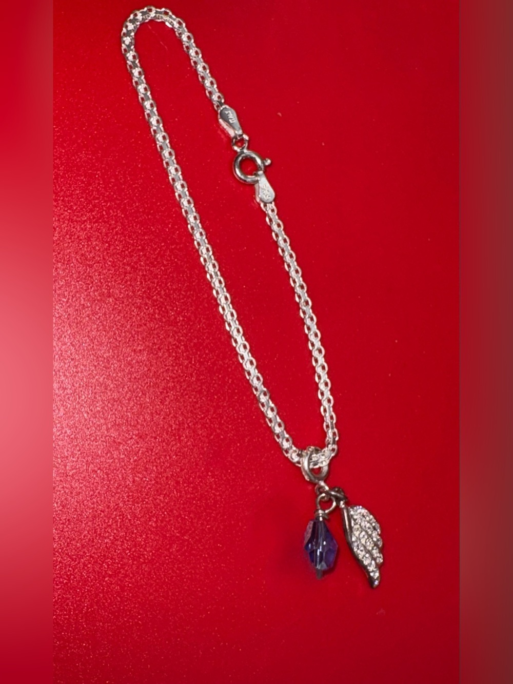 Sterling Silver Angel Wing Bracelet with Blue Crystal Charm